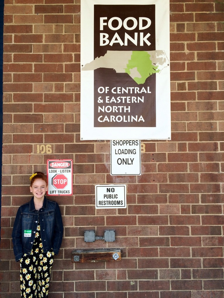Photo of Mackenzie at the Food Bank's Raleigh Branch
