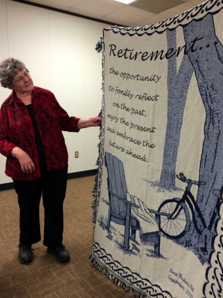 Photo of Pat Brown and retirement blanket